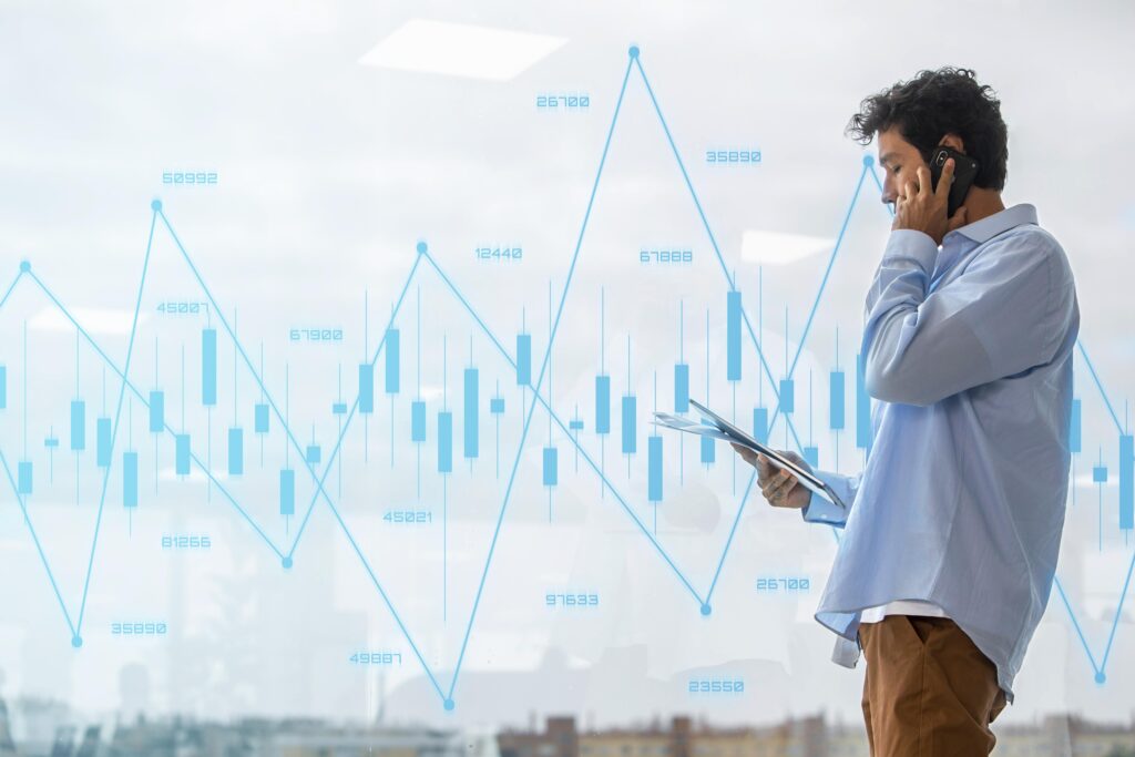 medium-shot-man-talking-phone during Indices or index Trading - Encore Capitals